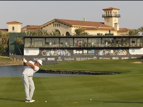 Bryson DeChambeau plays his third shot on the 18th hole during day one of the PIF Saudi International at Royal Greens Golf and Country Club on Feb. 3, 2022 in Al Murooj, Saudi Arabia.