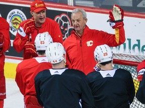 Calgary Flames head coach Darryl Sutter talks with the team during practise at the Scotiabank Saddledome in Calgary on Wednesday, December 29, 2021.