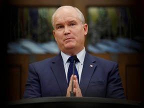 Conservative Party leader Erin O'Toole speaks to the media about the government’s economic update on Parliament Hill in Ottawa, Dec. 14, 2021.