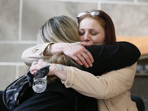 Rori Hache's mother Shanan Dionne (right) is comforted by Krysia Meeldyk. Human remains were identified as 19-year-old Kandis Fitzpatrick and Durham Regional Police held a news conference on Wednesday, Feb. 16, 2022.