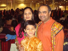 Jayesh Prajapati was fatally injured Saturday, Sept. 15, 2012 in a "gas and dash" at a Toronto Shell station. Parjapati is pictured with his wife Vaishali and son Rishabh.