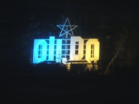 The Dildo sign is lit up in blue and yellow for Ukraine.
