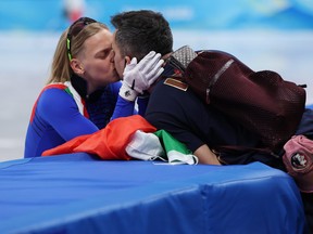 Arianna Fontana caused a bit of a stir when she laid a kiss on her American-born coach, who also happens to be her husband, after winning gold on Monday in Beijing.