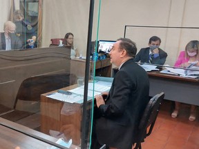 Roman Catholic Bishop Gustavo Zanchetta, accused of sexually abusing young men in northern Argentina, sits in court, in Oran, Argentina February 21, 2022.