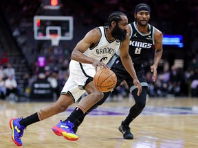 76ers affect James Harden from Nets for Ben Simmons, others: Document 3 Brooklyn Nets guard James Harden (13) dribbles the ball around Sacramento Kings forward Maurice Harkless (8) during the first quarter at Golden 1 Center.