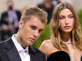 Justin Bieber and Hailey Bieber attend The 2021 Met Gala Celebrating In America: A Lexicon Of Fashion at Metropolitan Museum of Art on September 13, 2021 in New York City