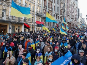 People take part in the Unity March, which is a procession to demonstrate Ukrainians' patriotic spirit amid growing tensions with Russia, in Kyiv, Ukraine February 12, 2022.