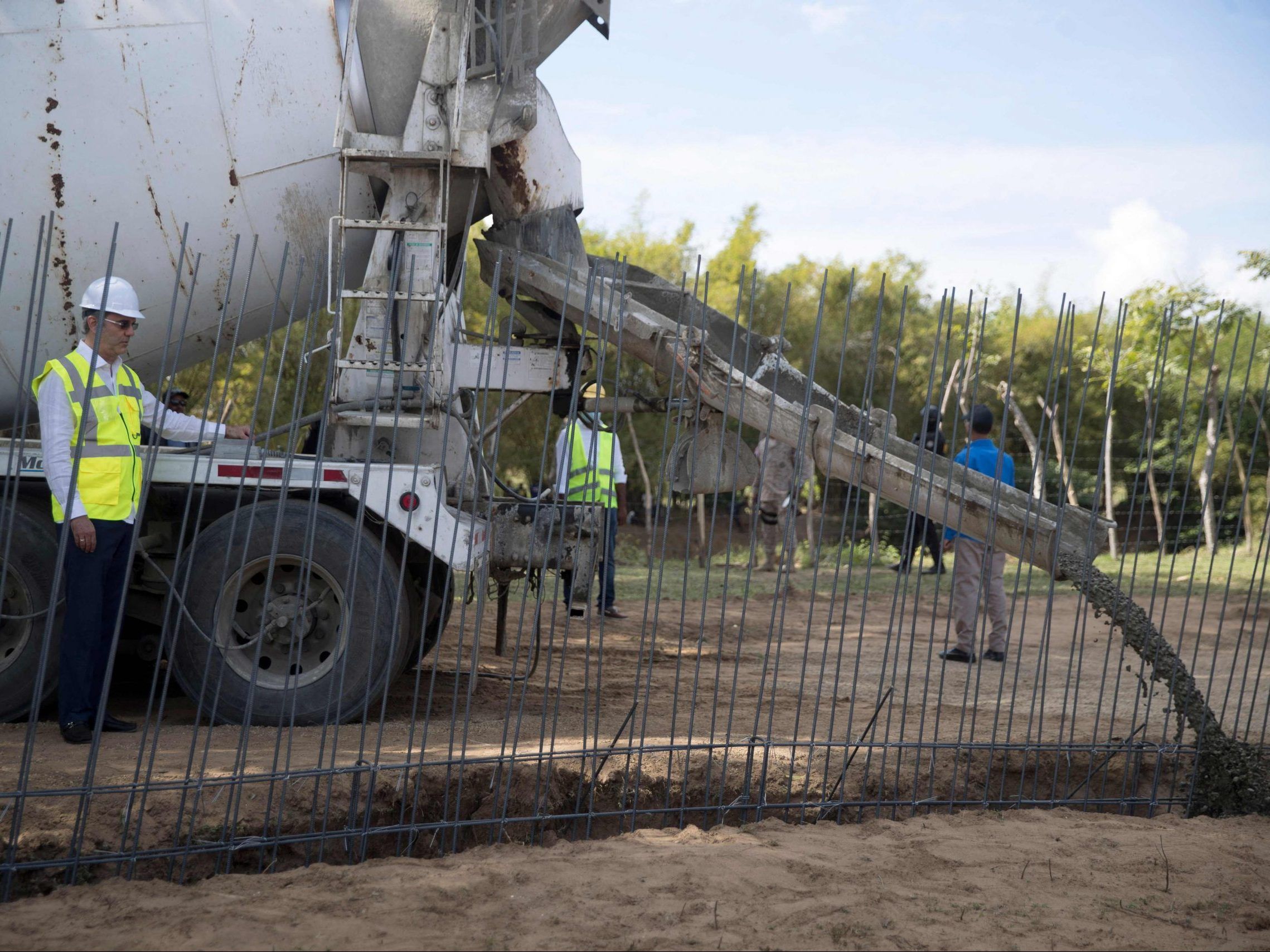 Dominican Republic Begins Building Border Wall With Haiti Toronto Sun   LUIS ABINADER Scaled E1645410387711 