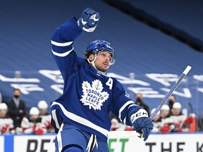 Maple Leafs' Auston Matthews celebrates after scoring against New Jersey Devils at an empty Scotiabank Arena. The Leafs and Raptors can return to 50% capacity as of Thursday, Feb. 17.