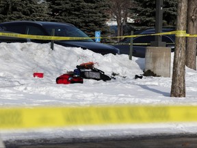 Medical equipment sits in the snow as police and paramedics respond to a shooting outside of the South Education Center school in Richfield, Minn., Feb. 1, 2022.