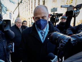 Former attorney Michael Avenatti makes his way through a crowd of news cameras as he arrives at the United States Courthouse during his criminal trial in New York City, Jan. 27, 2022.