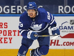 Nick Robertson of the Toronto Maple Leafs skates against the Calgary Flames during an NHL game at Scotiabank Arena on April 13, 2021 in Toronto.