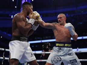 Anthony Joshua in action against Oleksandr Usyk at Tottenham Hotspur Stadium in London September 25, 2021.