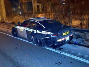The OPP Highway Safety Divison tweeted late Monday night that an OPP vehicle — with its lights flashing — was struck while the officer was helping a driver on highway 403/Main Street, in Hamilton.