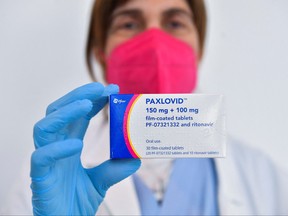 Dr. Cesira Nencioni, director of infectious diseases at Misericordia hospital, holds COVID-19 treatment pill Paxlovid, in Grosseto, Italy, Feb. 8, 2022.