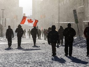 Police from various forces across the country joined together to try to bring the “Freedom Convoy” occupation to an end Saturday, Feb. 19, 2022. ASHLEY FRASER/POSTMEDIA NETWORK