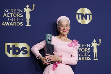 Actor Helen Mirren poses backstage with the Life Achievement Award at the 28th Screen Actors Guild Awards, in Santa Monica, Calif., Sunday, Feb. 27, 2022.