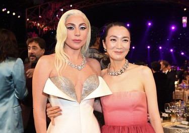 U.S. actress and singer Lady Gaga (L) poses with South Korean actress Kim Joo-ryeong during the 28th Annual Screen Actors Guild Awards at the Barker Hangar in Santa Monica, Calif., Sunday, Feb. 27, 2022.