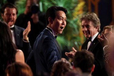 Actor Lee Jung-Jae reacts after winning the award for Outstanding Performance by a Male Actor in a Drama Series for "Squid Game" at the 28th Screen Actors Guild Awards, in Santa Monica, Calif., Sunday, Feb. 27, 2022.