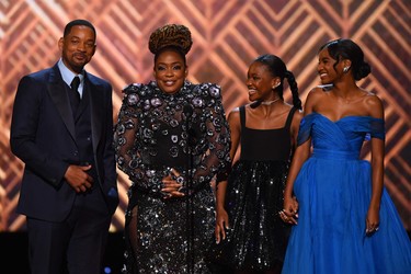 (From left to right) U.S. actor Will Smith, U.S. actress Aunjanue Ellis, U.S. actress Demi Singleton and U.S. actress Saniyya Sidney speak onstage during the 28th Annual Screen Actors Guild Awards at the Barker Hangar in Santa Monica, Calif., Sunday, Feb. 27, 2022.