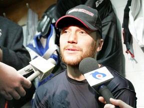 In this Dec. 22, 2005 file photo, Los Angeles Kings centre Sean Avery speaks to the media during a media availablity in the visitors dressing room at Rexall Place in Edmonton.