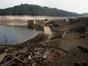 A general view shows the ancient village of Aceredo that had been submerged by Limia river in the 1990s after the dam was built in Concello de Lobios, Spain, February 10, 2022.