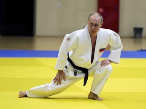Russian President Vladimir Putin attends a judo training session at the Yug-Sport sport and training complex in the Black sea resort of Sochi, Russia, Feb. 14, 2019.