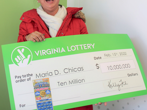 The state lottery said Maria Chicas, a stay-at-home mom, was given the Extreme Millions Scratcher ticket after her husband bought it at the In & Out Mart on Mathis Avenue in Manassas, Va.