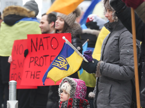 Toronto's Ukrainian community protest outside the Russian consulate on St Clair Ave E. demanding the stoppage of war throughout the Ukraine by Russian military forces.