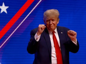 Former U.S. President Donald Trump gestures during the Conservative Political Action Conference (CPAC) at The Rosen Shingle Creek on Feb. 26, 2022 in Orlando, Fla.