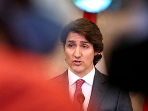 Canada's Prime Minister Justin Trudeau comments on the on going truckers mandate protest during a news conference on Parliament Hill in Ottawa, Canada on February 14, 2022.