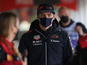 Red Bull's Dutch driver Max Verstappen arrives for a press conference during the second day of the Formula One (F1) pre-season testing at the Circuit de Barcelona-Catalunya in Montmelo, Barcelona province, on February 24, 2022.