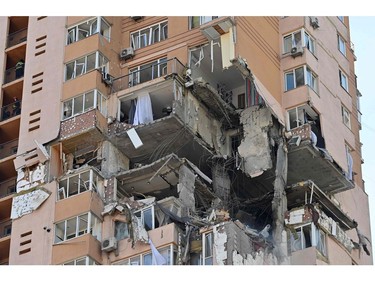 A view of a high-rise apartment block which was hit by recent shelling in Kyiv on Feb. 26, 2022.