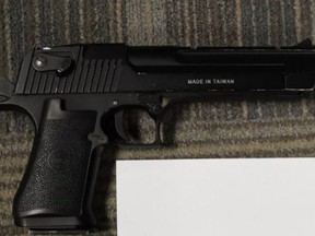 Police say they seized this replica handgun when they arrested a man last week for a series of armed robberies.