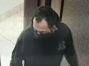 Investigators need help identifying a man who is suspected of pouring a flammable liquid in an apartment building near York Mills and Valley Woods Rds. on Dec. 8, 2021.