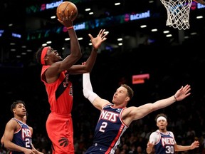 Feb 28, 2022; Brooklyn, New York, USA; Toronto Raptors forward Pascal Siakam (43) drives to the basket against Brooklyn Nets forward Blake Griffin (2) and guard Cam Thomas (24) during the first quarter at Barclays Center.