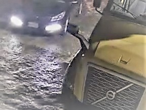 Police in Peterborough are searching for this blue sedan in connection with a tractor-trailer theft.