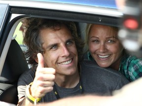 US actor Ben Stiller (L) gives his thumb up next to his wife US actress Christine Taylor as he attends on July 6, 2009, the 196 km third stage of the 2009 Tour de France cycling race run between Marseille and La Grande-Motte.