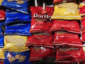 In this Thursday, April 29, 2010, file photo, bags of Doritos corn chips are displayed at a kiosk, in New York.