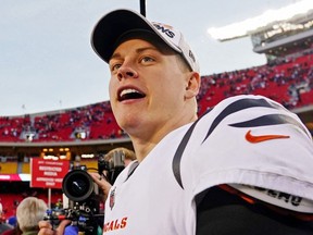 Cincinnati Bengals quarterback Joe Burrow celebrates after winning the AFC Championship Game against the Kansas City Chiefs at GEHA Field at Arrowhead Stadium.