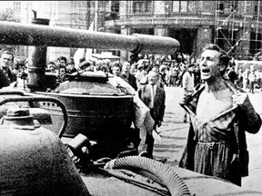 CZECHOSLOVAKIA 1968: A gutsy Czech faces down a Russian tank. GETTY IMAGES