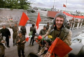 AFGHANISTAN 1979: This Red Army soldier looks happy to be going home after the FSU withdrawal in 1988. GETTY IMAGES