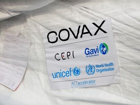 A pack of AstraZeneca/Oxford vaccines is seen as the country receives its first batch of coronavirus disease (COVID-19) vaccines under COVAX scheme, at the international airtport of Accra, Ghana February 24, 2021.