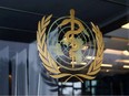 The World Health Organization logo is pictured at the entrance of the WHO building, in Geneva, Switzerland, Dec. 20, 2021.