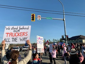 Drumming, dance music and flags filled the air at the corner of 176th Street and 8th Avenue, where RCMP had set up a blockade preventing vehicles from making their way toward the border crossing.