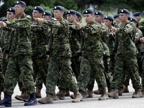 Graduates march during a graduation ceremony for the Canadian Armed Forces’ Bold Eagle program held at a military base near Wainwright, Alta., on Aug.10, 2017. Bold Eagle is a summer training and employment program for Indigenous youth that combines military training and Aboriginal cultural awareness.