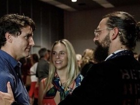 Kyle Kemper (right) and Prime Minister Justin Trudeau are pictured in Montreal in 2019.