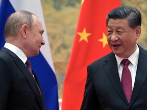 Russian President Vladimir Putin attends a meeting with Chinese President Xi Jinping in Beijing, China February 4, 2022.