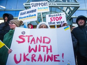 Ukraine supporters protesting Russia's invasion of Ukraine rally in Toronto on Friday.
