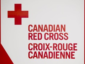 The Canadian Red Cross logo, photographed at a PCL construction site on the corner of 2 St and 2 Ave SW in downtown Calgary, Alta., on Friday, June 13, 2014.